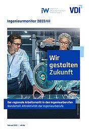 Ingenieurin und Ingenieur arbeiten zusammen an virtuellem Großbildschirm
